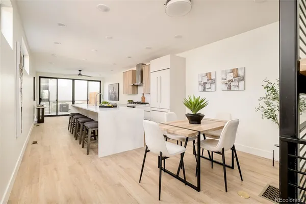 a view of a dining room with furniture and a livingroom