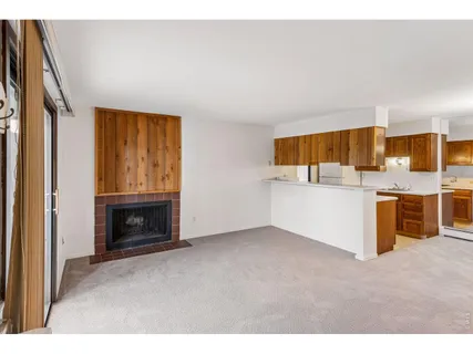 a view of kitchen and kitchen with furniture