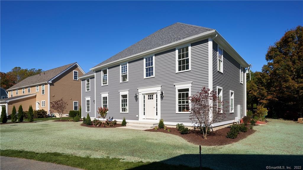 957 Old Clinton Road, Unit B Westbrook, CT 06498 - Photo 1 of 1 a view of a house with backyard