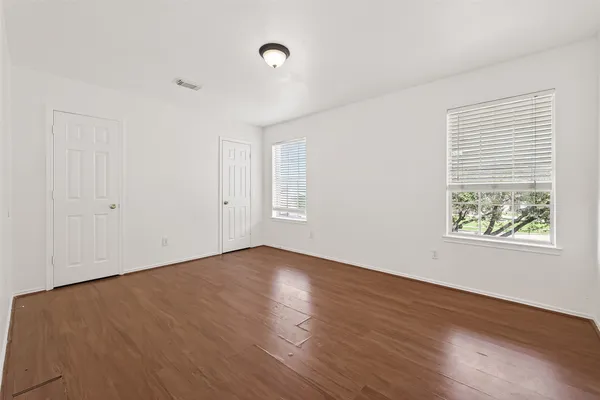 a living room with furniture and window