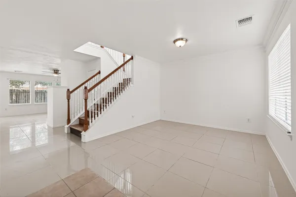 a view of entryway and hall with a window