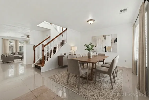 a view of an empty room with stairs