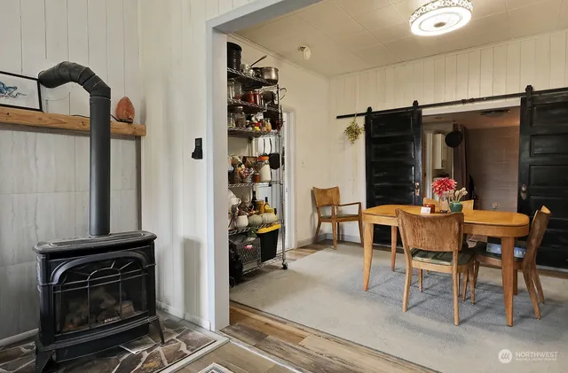 a view of a livingroom with furniture and front door