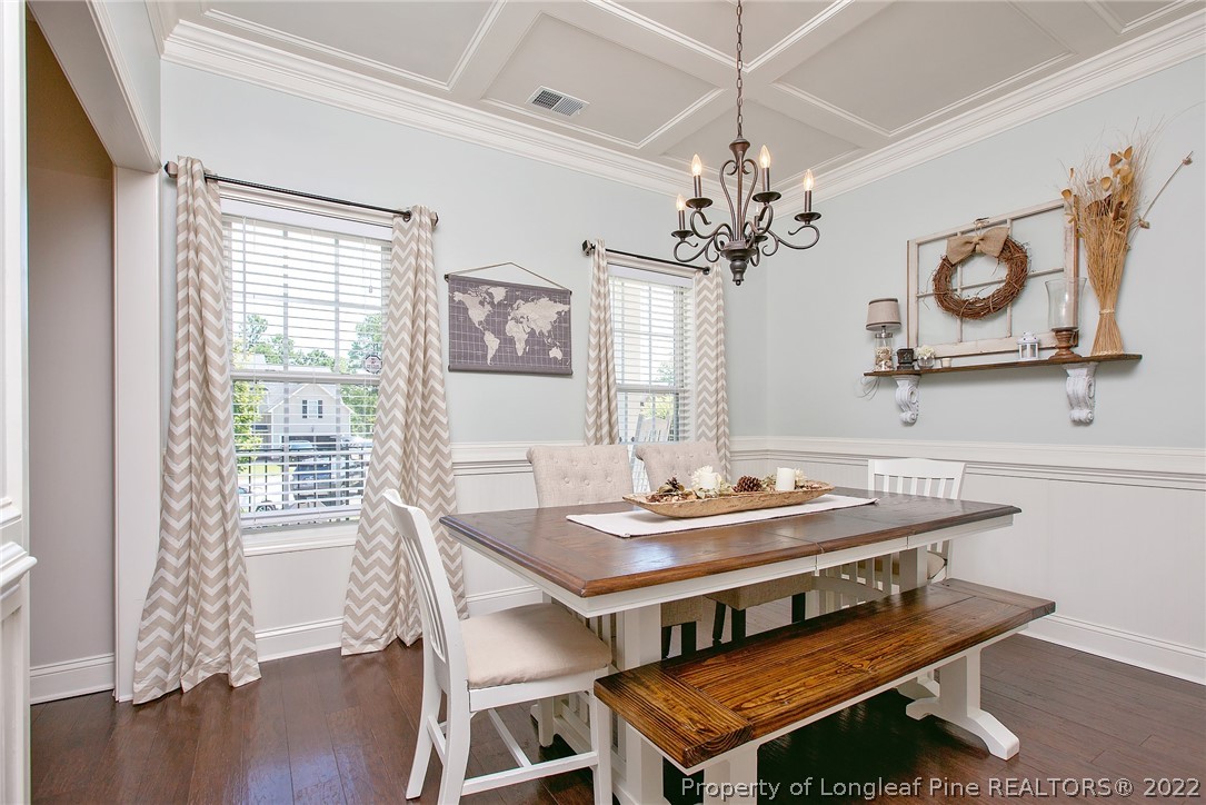 71 Germantown Road Cameron, NC 28326 - Photo 6 of 36 a view of a dining room with furniture wooden floor and chandelier