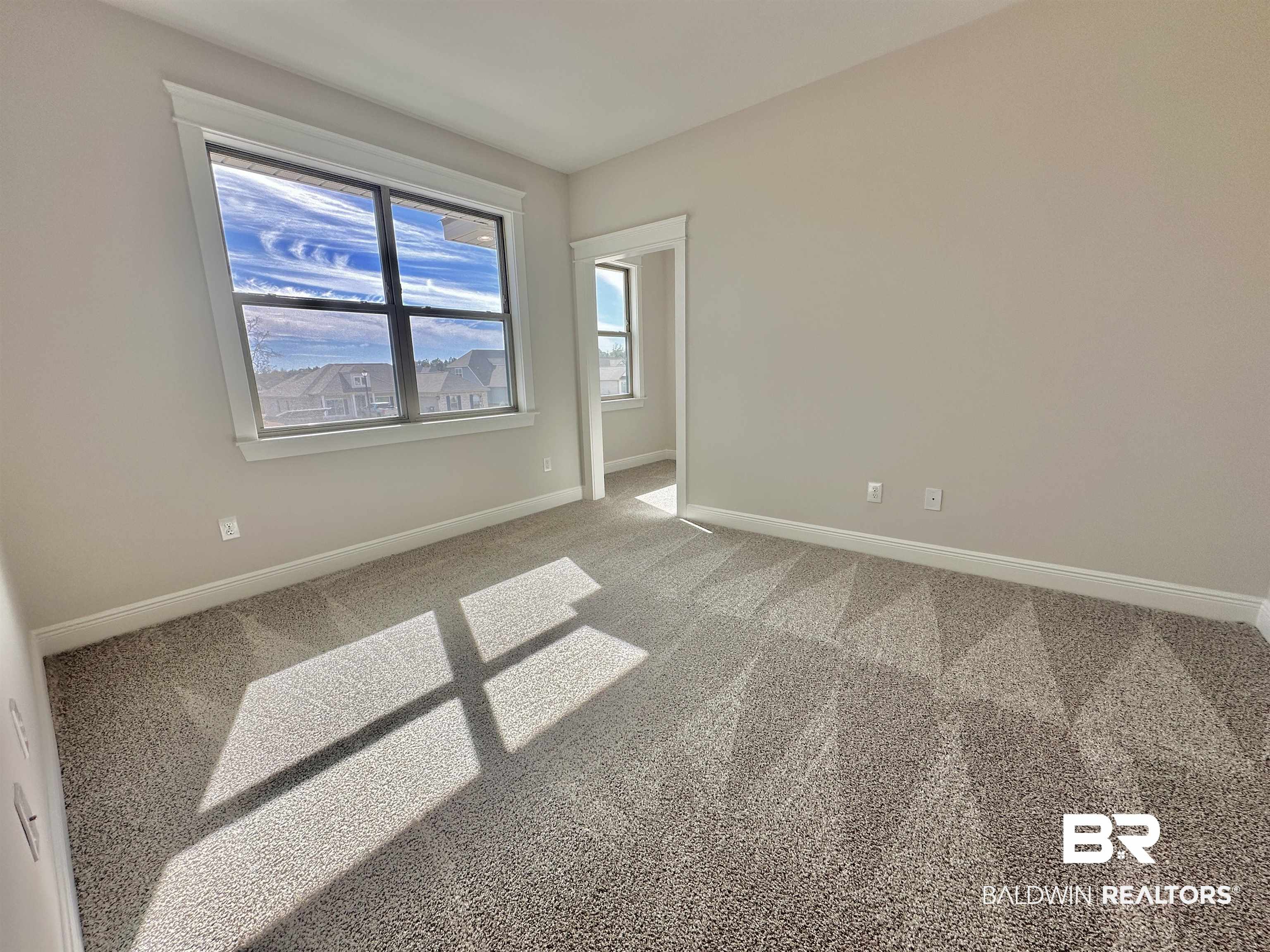 691 Kitfox Avenue Fairhope, AL 36532 - Photo 20 of 42 Spare room featuring carpet floors