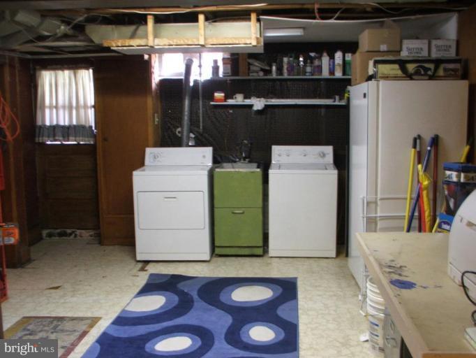 622 Braeside Road Baltimore, MD 21229 - Photo 13 of 17 a view of washer and dryer