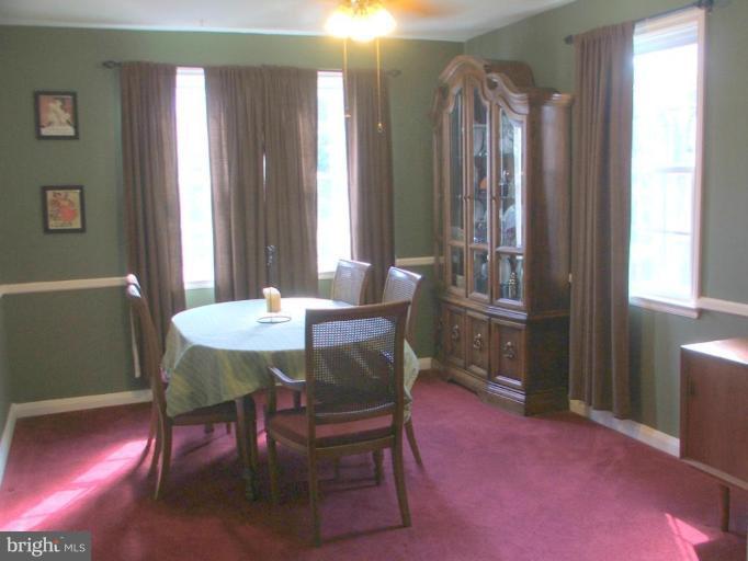 622 Braeside Road Baltimore, MD 21229 - Photo 6 of 17 a view of a dining room with furniture and window
