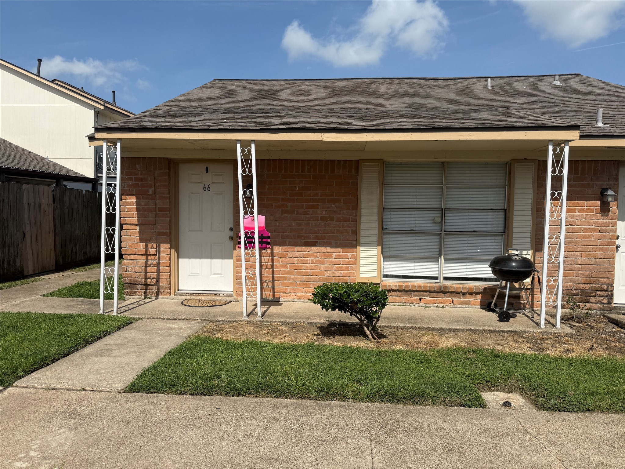 0 Burke Road Pasadena, TX 77504 - Photo 13 of 18 a front view of a house with a yard