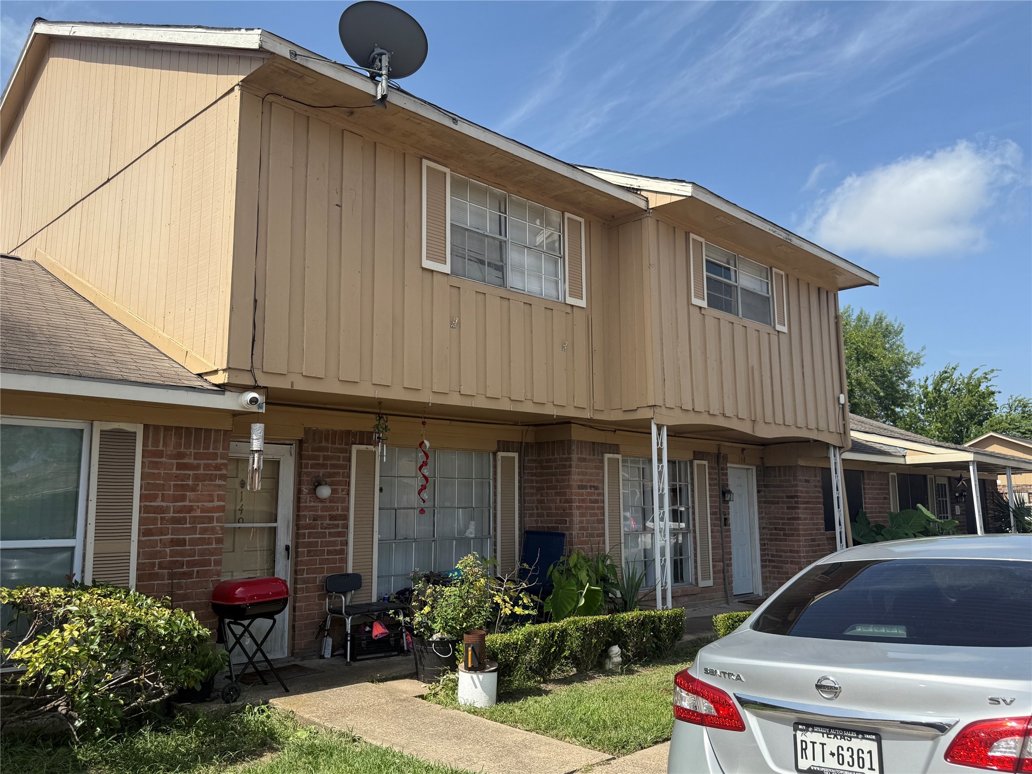 0 Burke Road Pasadena, TX 77504 - Photo 15 of 18 a front view of a house with garden