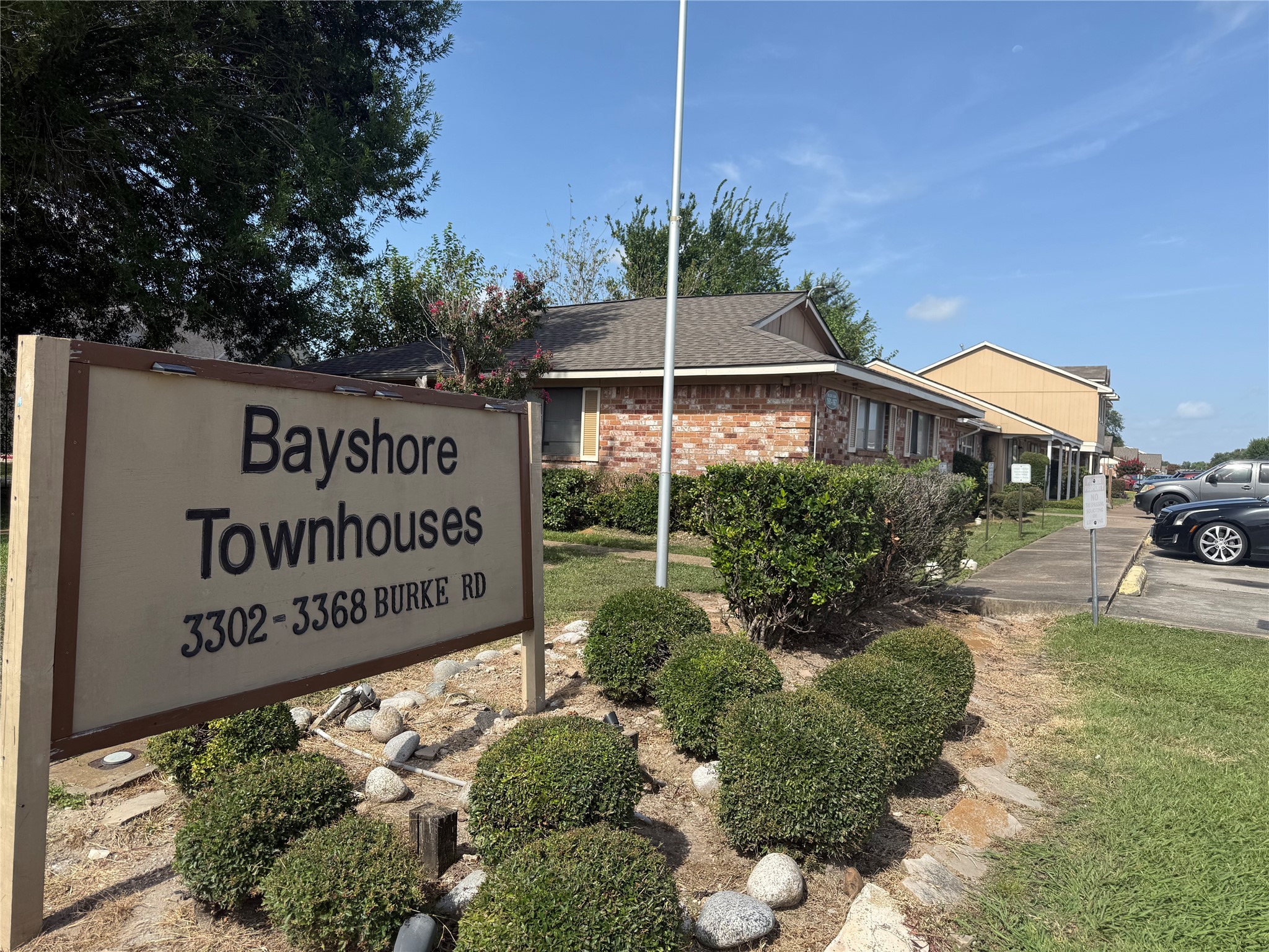 0 Burke Road Pasadena, TX 77504 - Photo 2 of 18 a sign on the side of the road