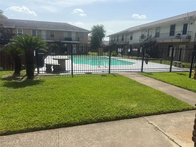 a view of a park with swings