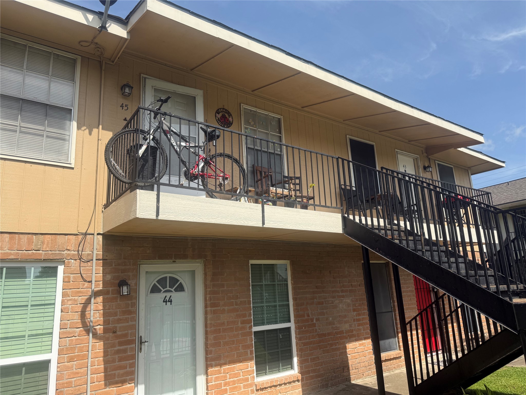 0 Burke Road Pasadena, TX 77504 - Photo 10 of 18 a view of a porch with wooden floor and stairs