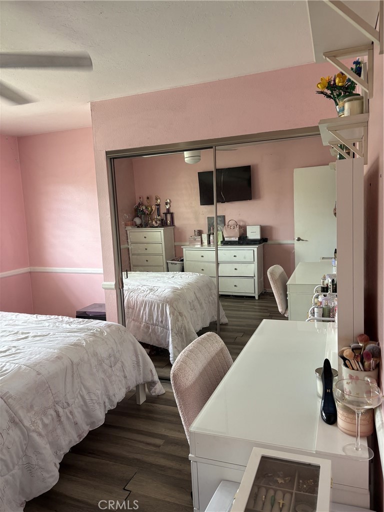 4731 Rey Drive, Unit 133 Huntington Beach, CA 92649 - Photo 18 of 31 a bedroom with two beds and glass window