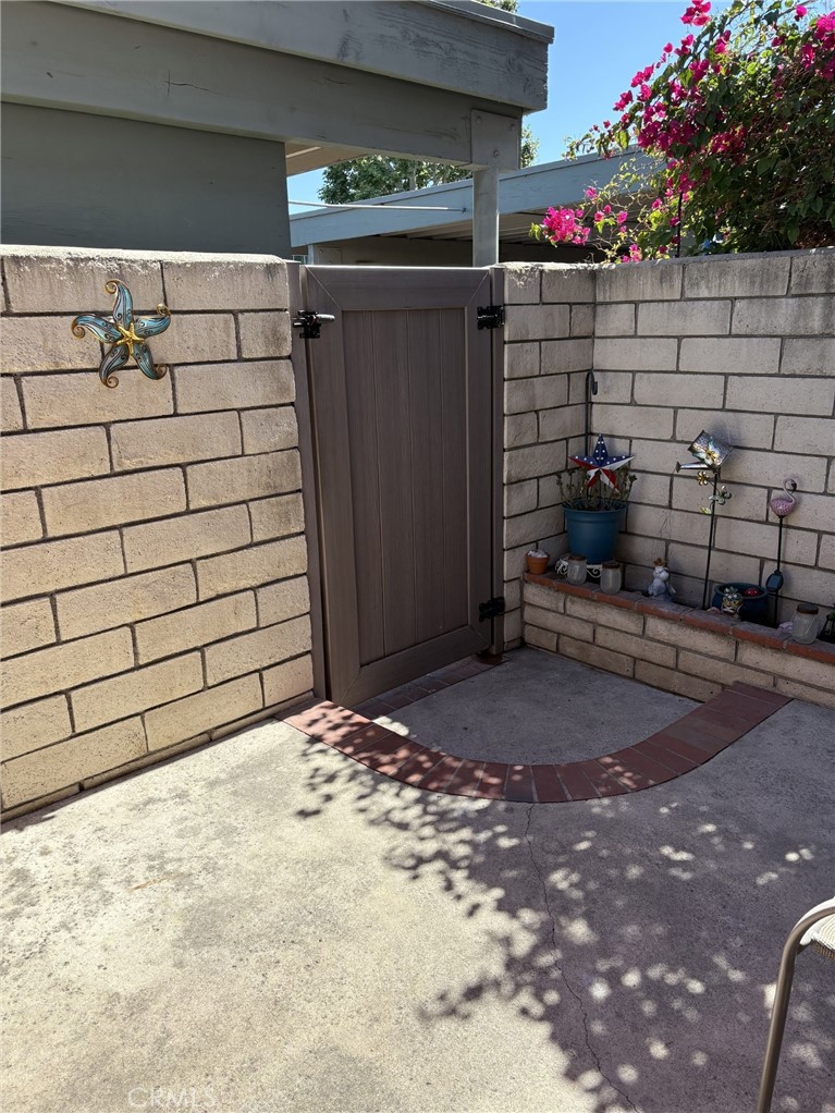 4731 Rey Drive, Unit 133 Huntington Beach, CA 92649 - Photo 27 of 31 a view of outdoor space and garage