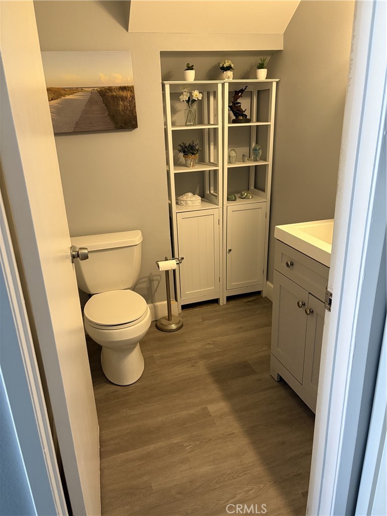 4731 Rey Drive, Unit 133 Huntington Beach, CA 92649 - Photo 8 of 31 a bathroom with a toilet and a shower