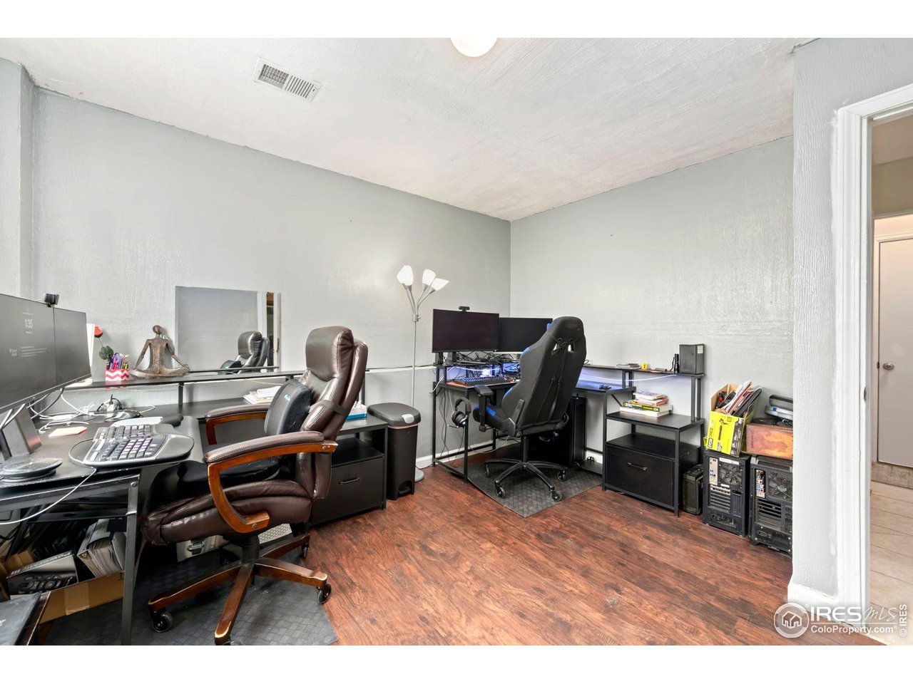1113 East 24th Street Road Greeley, CO 80631 - Photo 15 of 25 a view of a workspace with furniture and a workspace