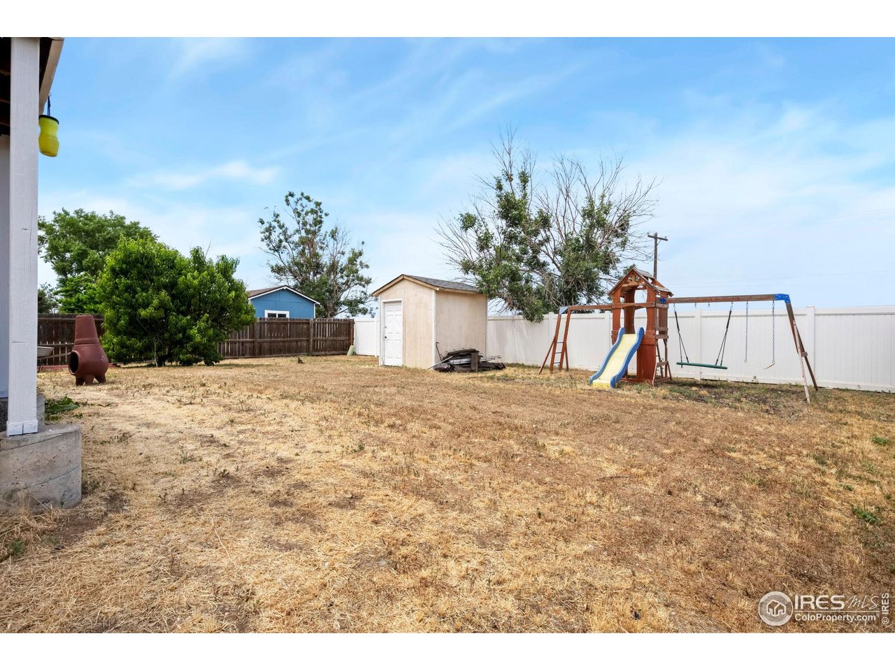 1113 East 24th Street Road Greeley, CO 80631 - Photo 20 of 25 a view of a backyard