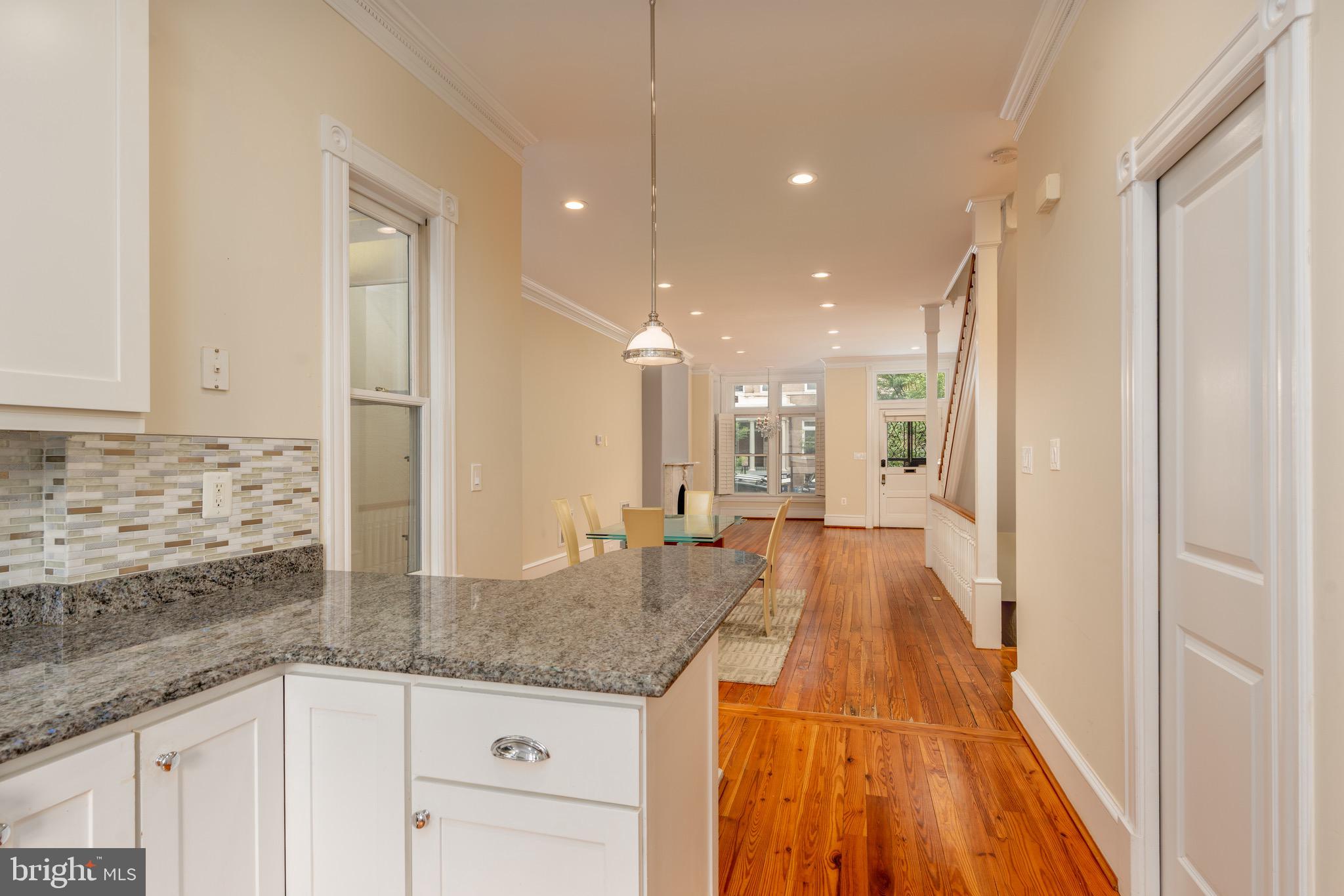 1716 22nd Street Northwest Washington, DC 20008 - Photo 11 of 40 a bathroom with a granite countertop sink and mirror