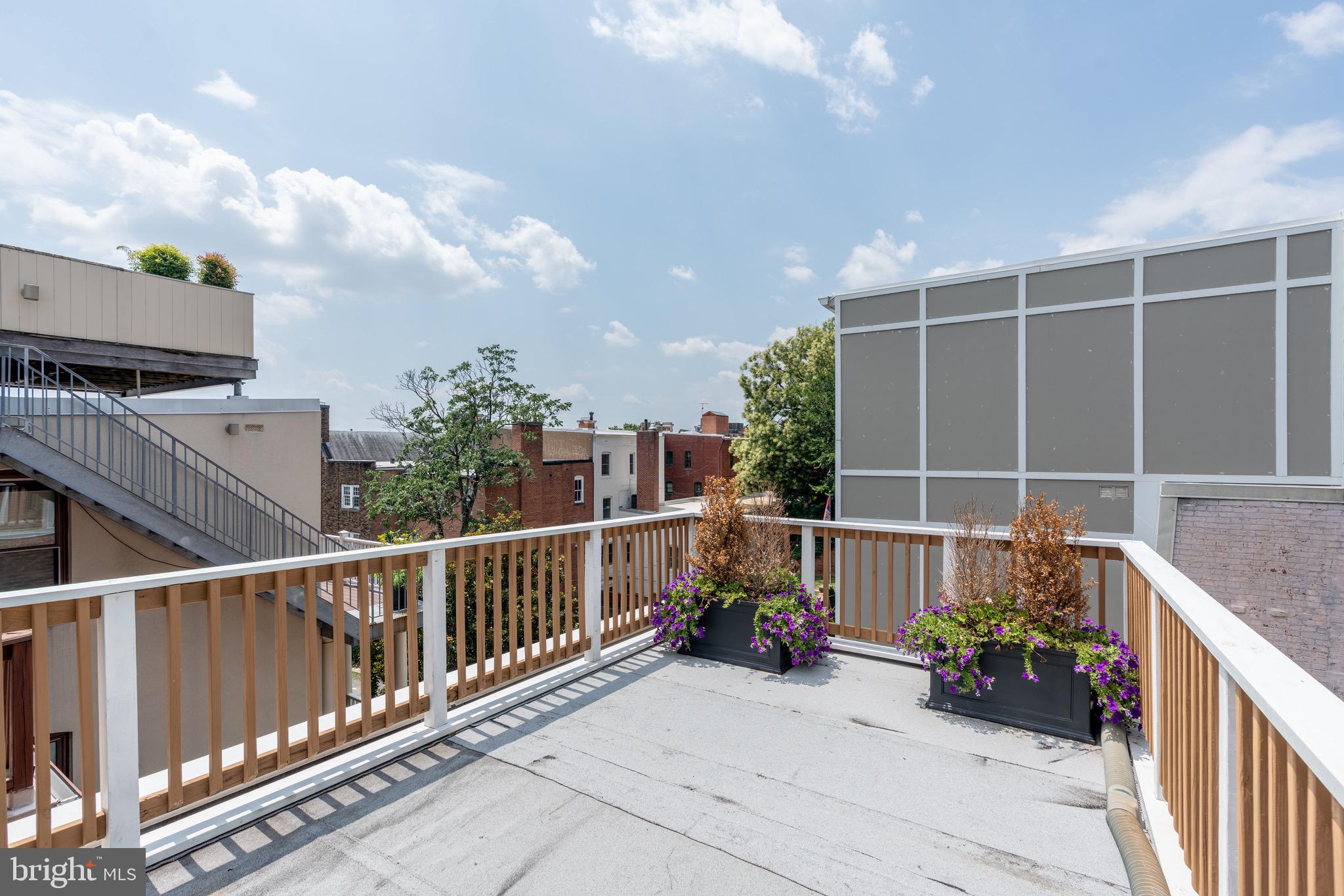 1716 22nd Street Northwest Washington, DC 20008 - Photo 31 of 40 a view of a porch with furniture