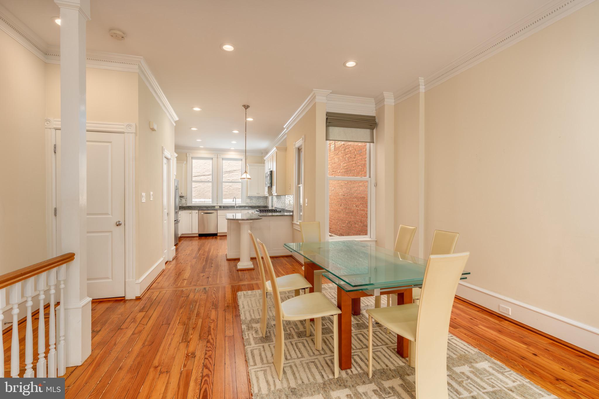 1716 22nd Street Northwest Washington, DC 20008 - Photo 6 of 40 a view of a dining room with furniture and wooden floor