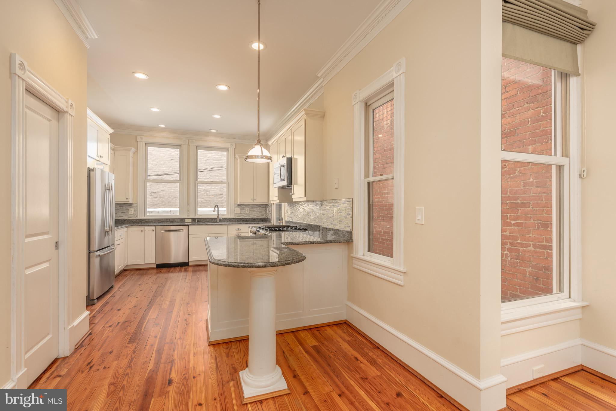 1716 22nd Street Northwest Washington, DC 20008 - Photo 7 of 40 a view of a kitchen with a large window