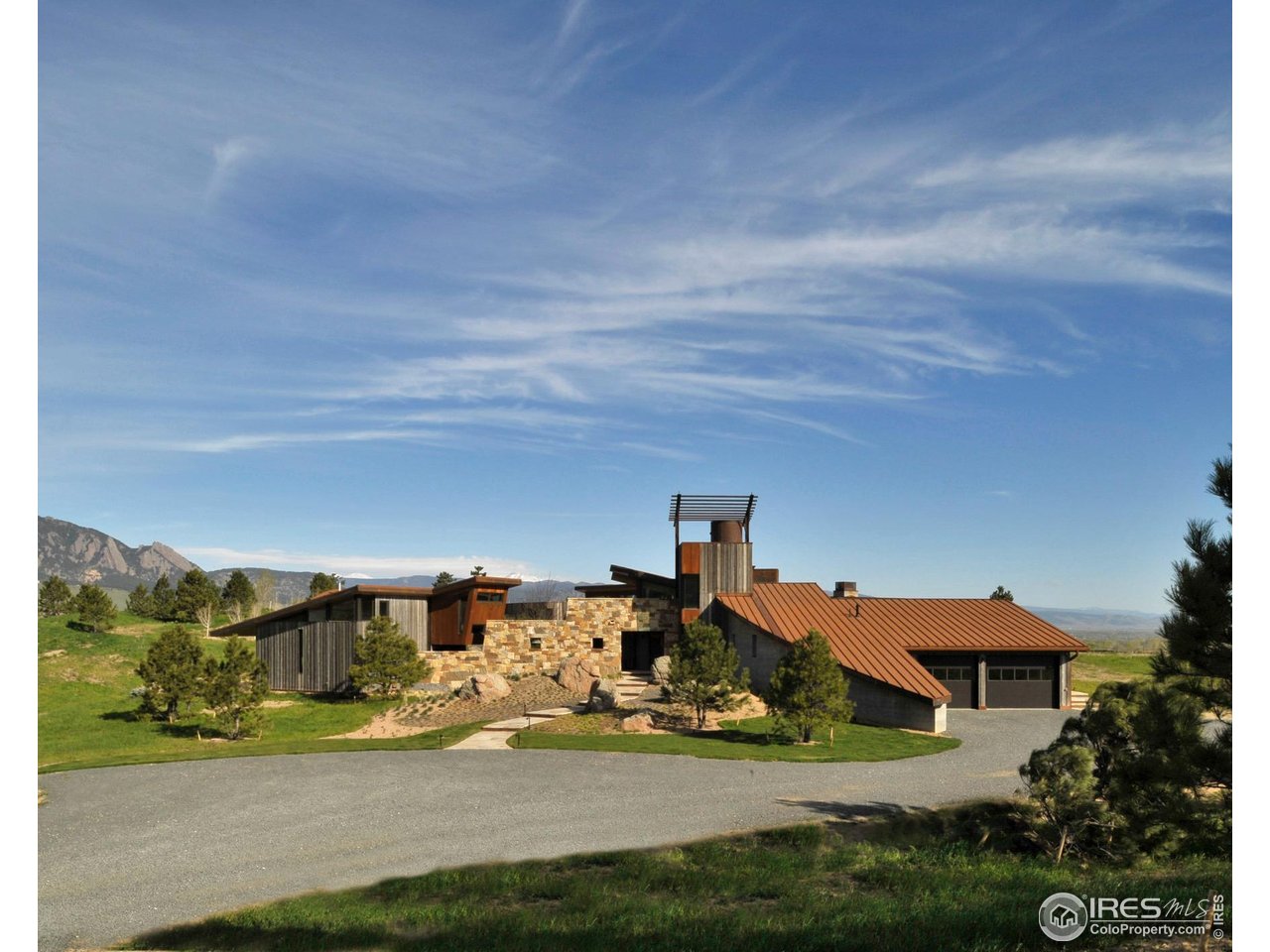 1355 South Cherryvale Road Boulder, CO 80303 - Photo 2 of 40 a front view of a house with yard