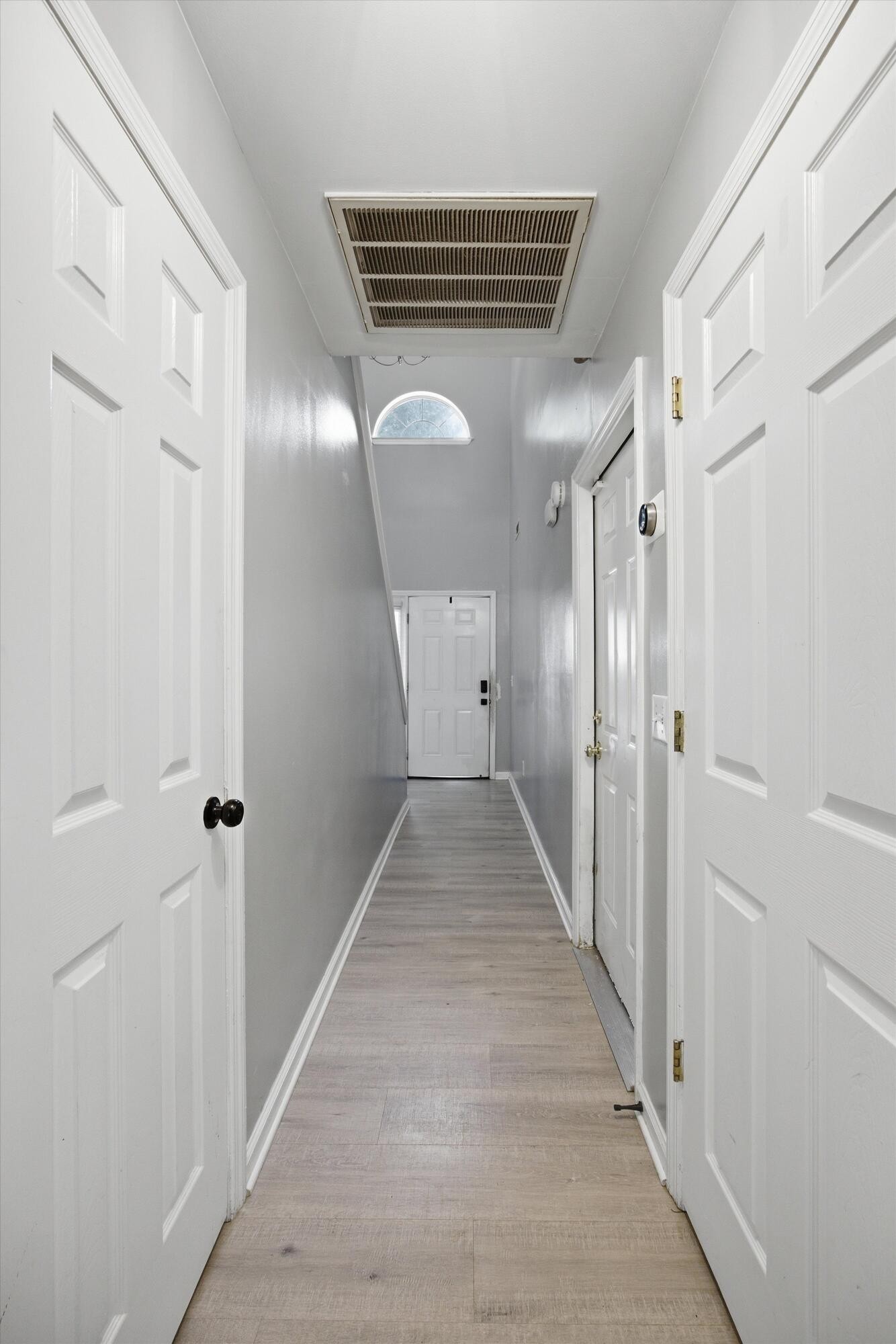 6729 Hickory Trace Circle Chattanooga, TN 37421 - Photo 4 of 30 a view of a hallway with wooden floor and staircase