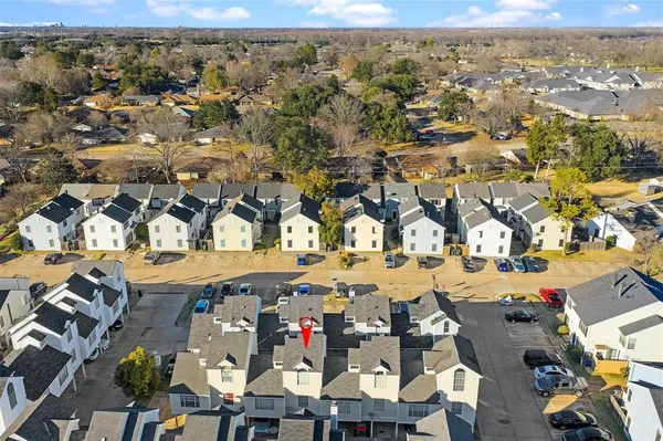 an aerial view of a city with lots of residential buildings
