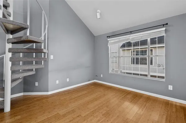a view of kitchen with wooden floor