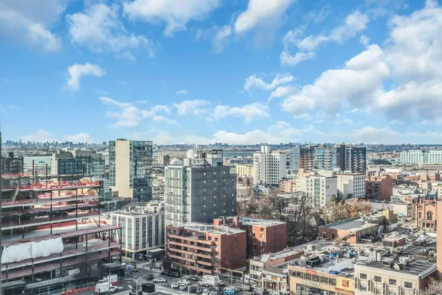 a view of a city with tall buildings
