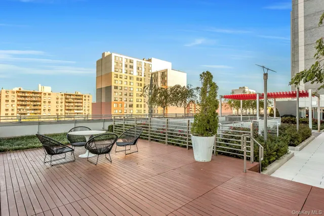a view of a terrace with sitting area
