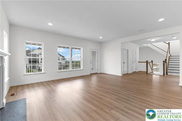 an empty room with windows