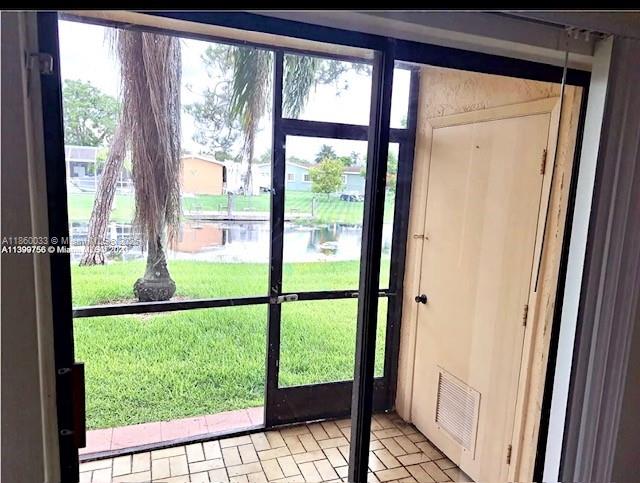 9317 Northwest 1st Court, Unit 105 Pembroke Pines, FL 33024 - Photo 23 of 25 a view of backyard from window