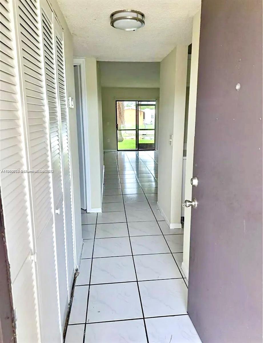 9317 Northwest 1st Court, Unit 105 Pembroke Pines, FL 33024 - Photo 24 of 25 a view of a entryway