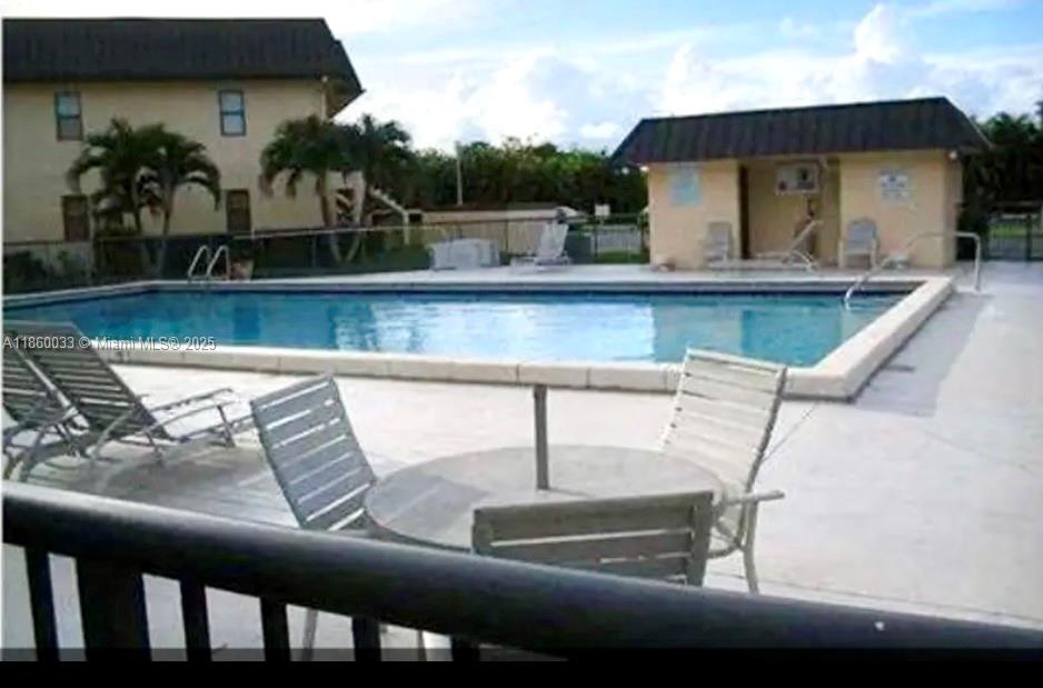 9317 Northwest 1st Court, Unit 105 Pembroke Pines, FL 33024 - Photo 3 of 25 a view of outdoor space with seating area