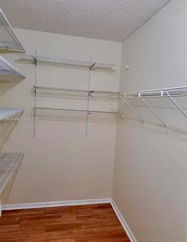 a view of a room with racks on the wall
