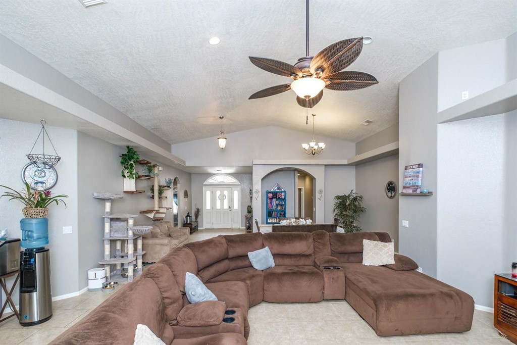 39405 Mountain View Road Yermo, CA 92398 - Photo 13 of 33 a living room with furniture kitchen view and a chandelier