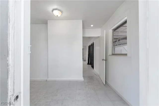 a view of a hallway with closet