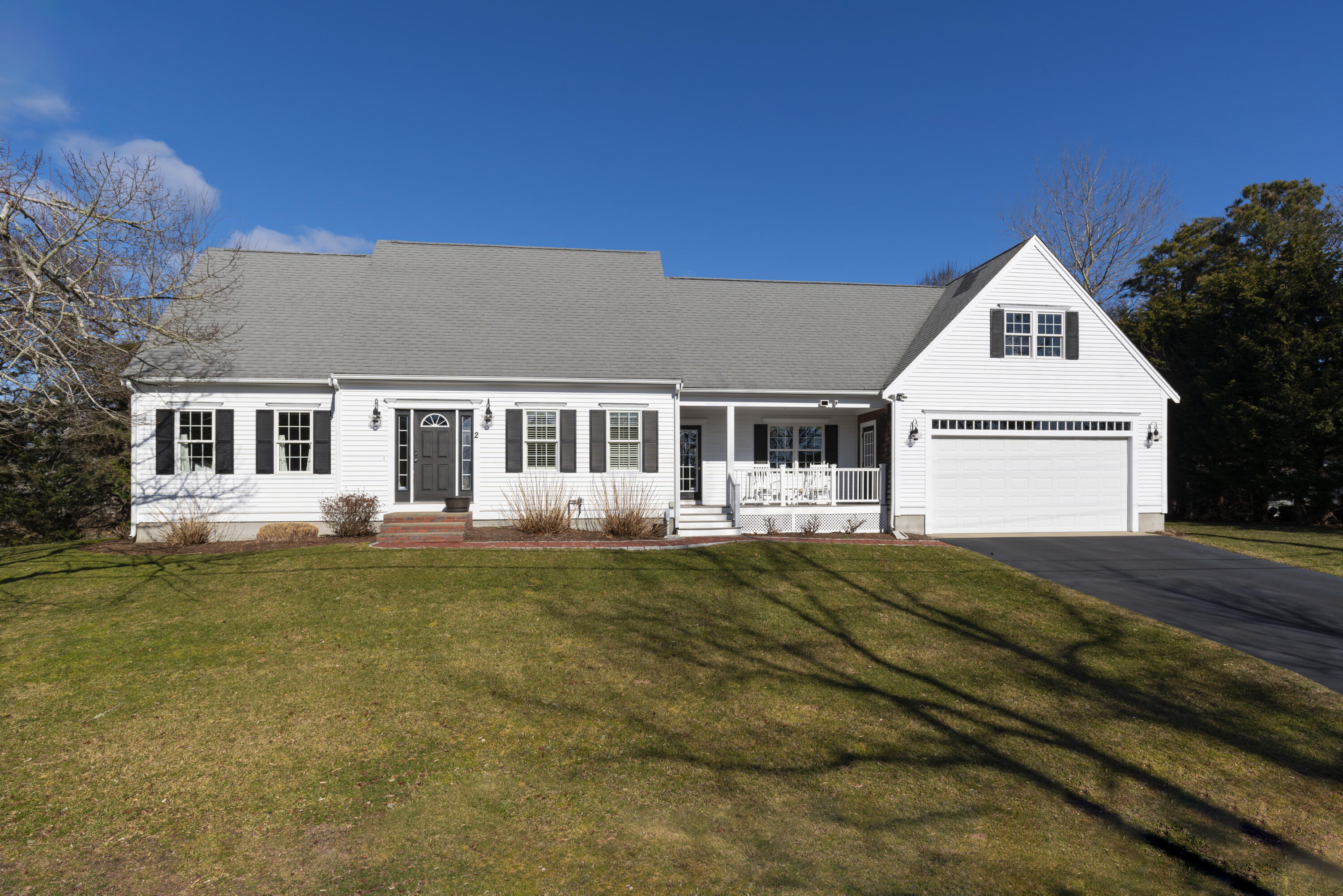 2 Parallel Street Harwich, MA 02645 - Photo 1 of 40 a front view of a house with a garden