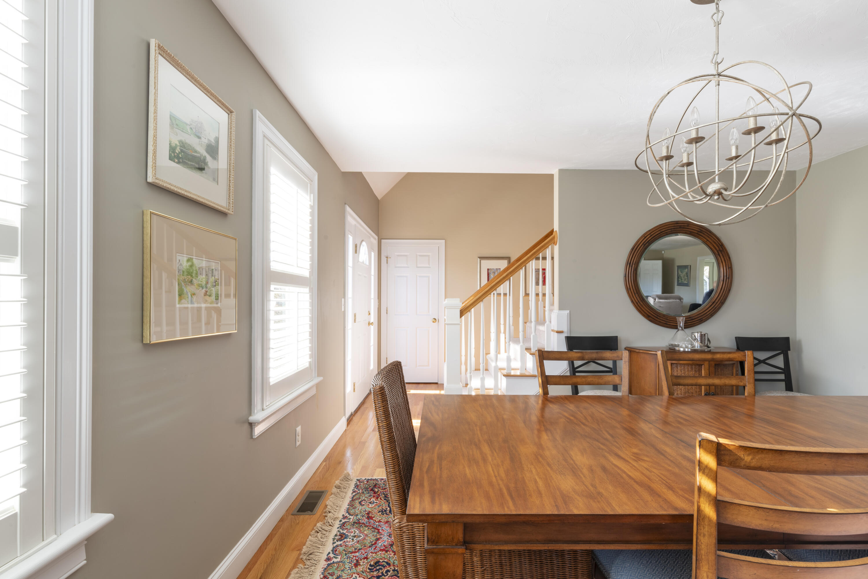 2 Parallel Street Harwich, MA 02645 - Photo 13 of 40 a view of a dining room with furniture a chandelier and a window