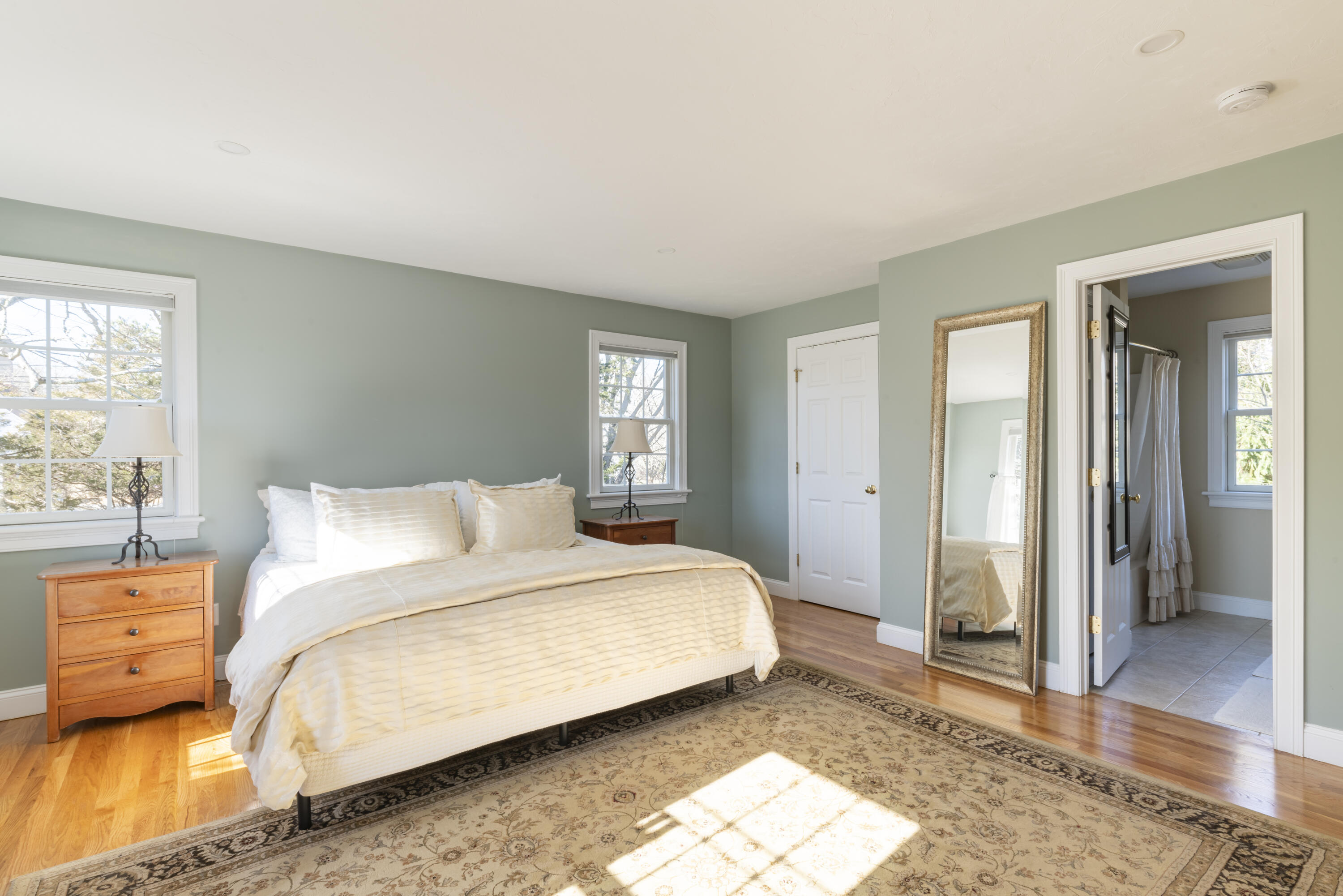 2 Parallel Street Harwich, MA 02645 - Photo 17 of 40 a bedroom with a bed and wooden floor