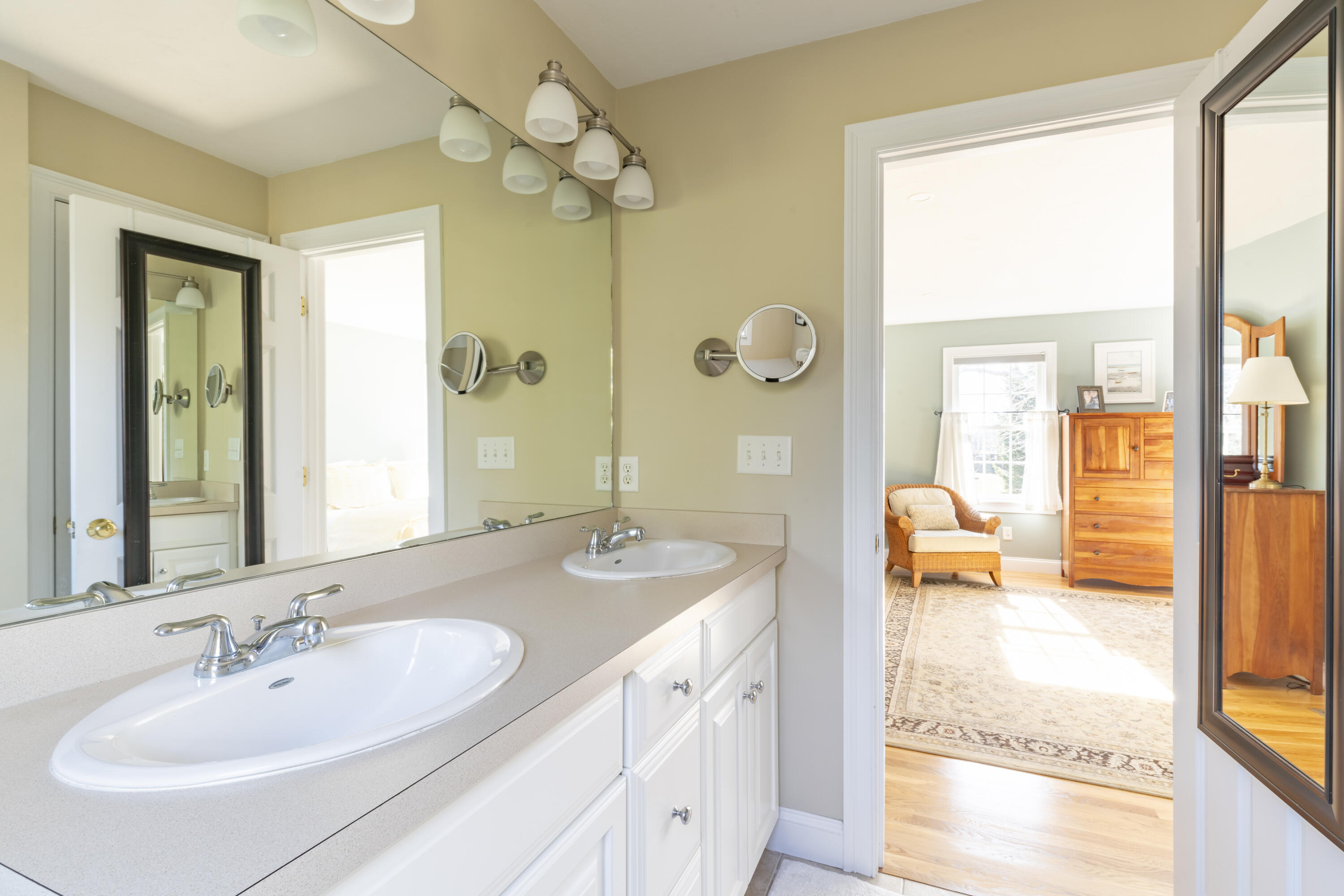 2 Parallel Street Harwich, MA 02645 - Photo 20 of 40 a en suite bathroom with a double vanity sink and a mirror