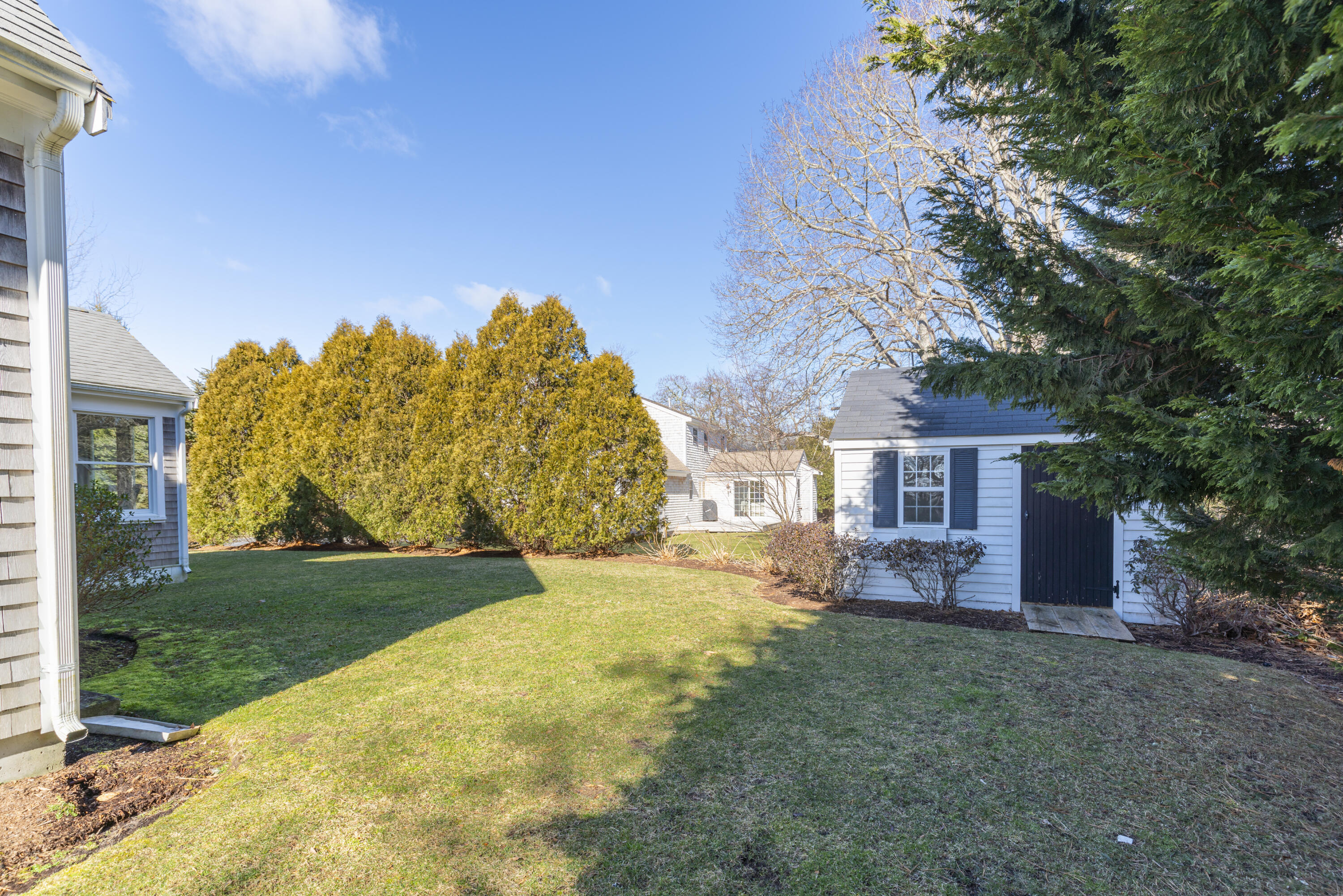 2 Parallel Street Harwich, MA 02645 - Photo 31 of 40 a view of a house with a yard