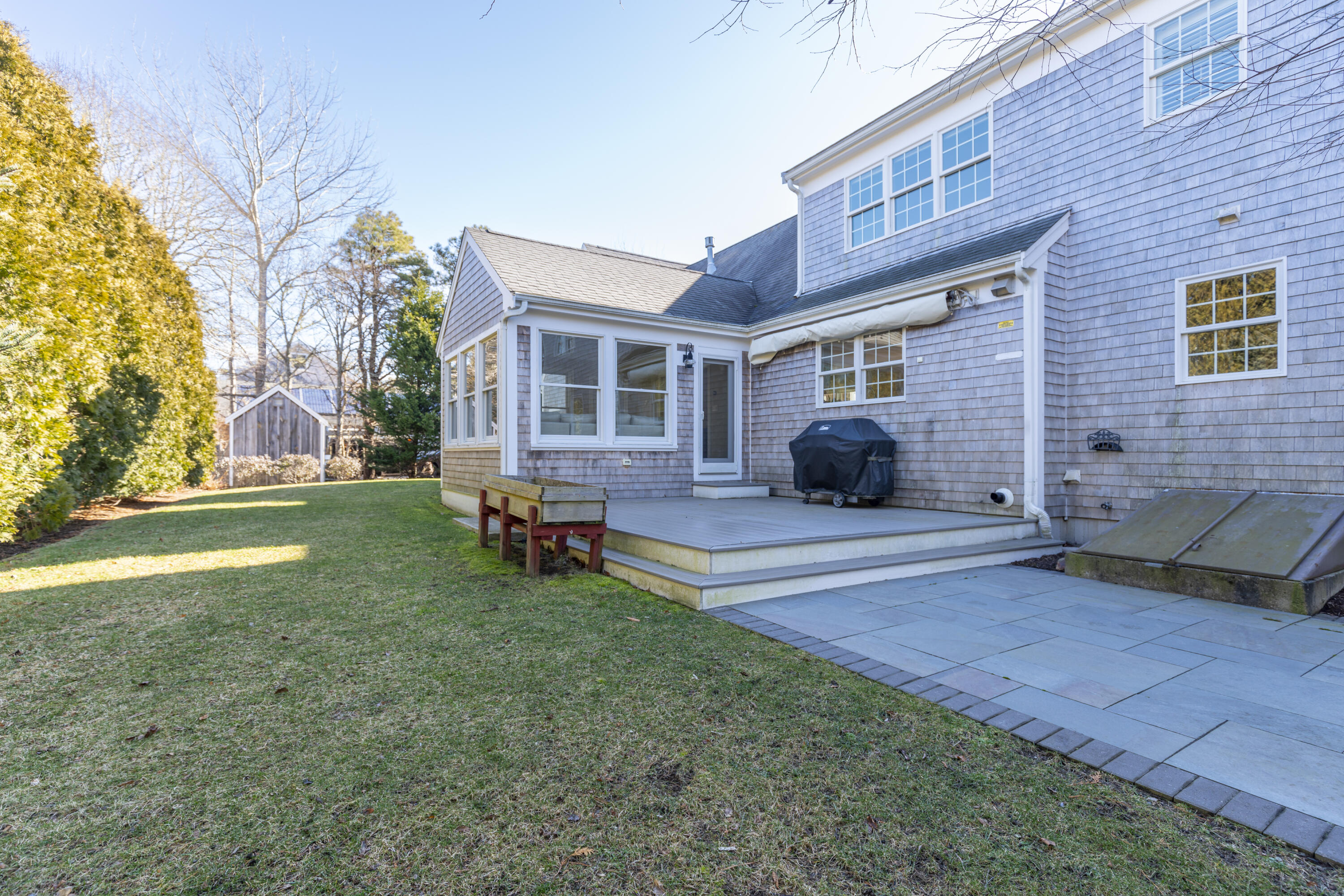 2 Parallel Street Harwich, MA 02645 - Photo 36 of 40 a view of a house with a yard and sitting area