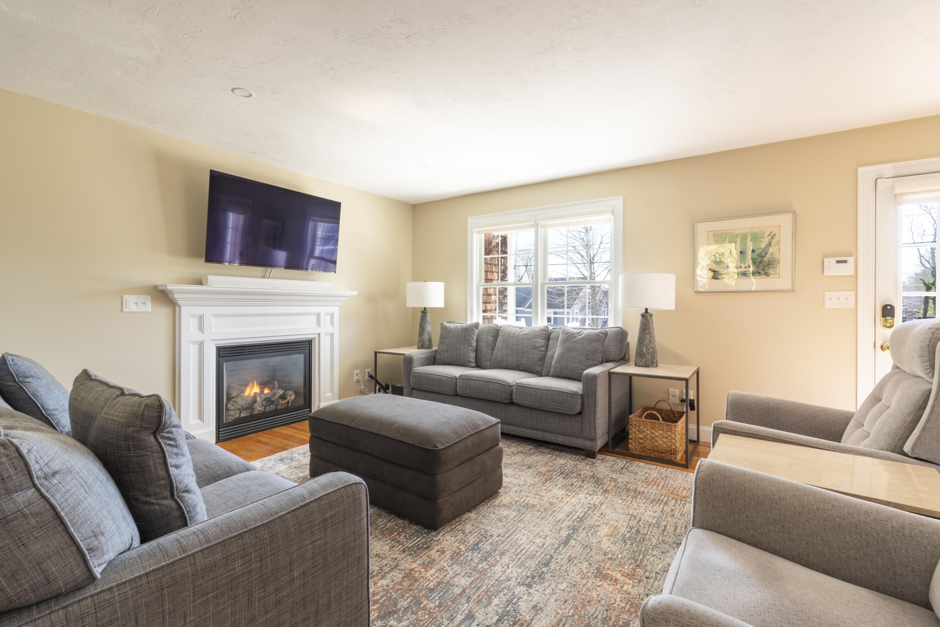 2 Parallel Street Harwich, MA 02645 - Photo 5 of 40 a living room with furniture window and a fireplace