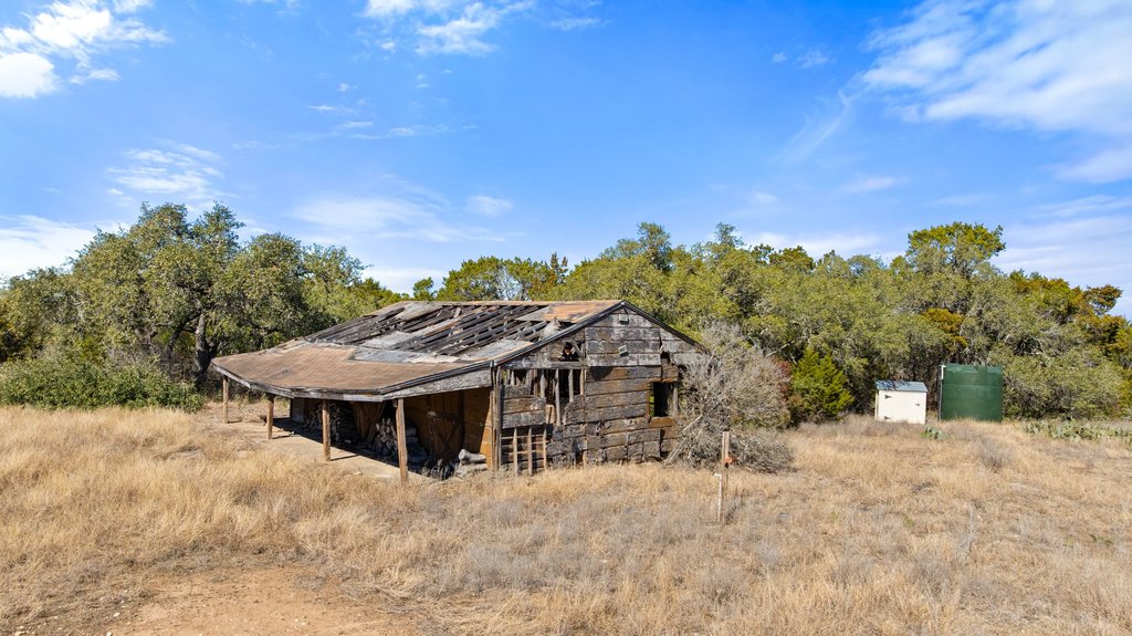 10904 Rawhide Trail Austin, TX 78736 - Photo 11 of 37 a view of a house with a yard