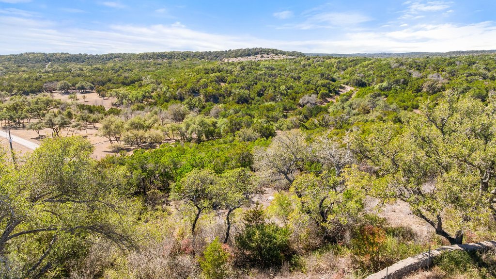 10904 Rawhide Trail Austin, TX 78736 - Photo 22 of 37 a view of a yard with an outdoor space