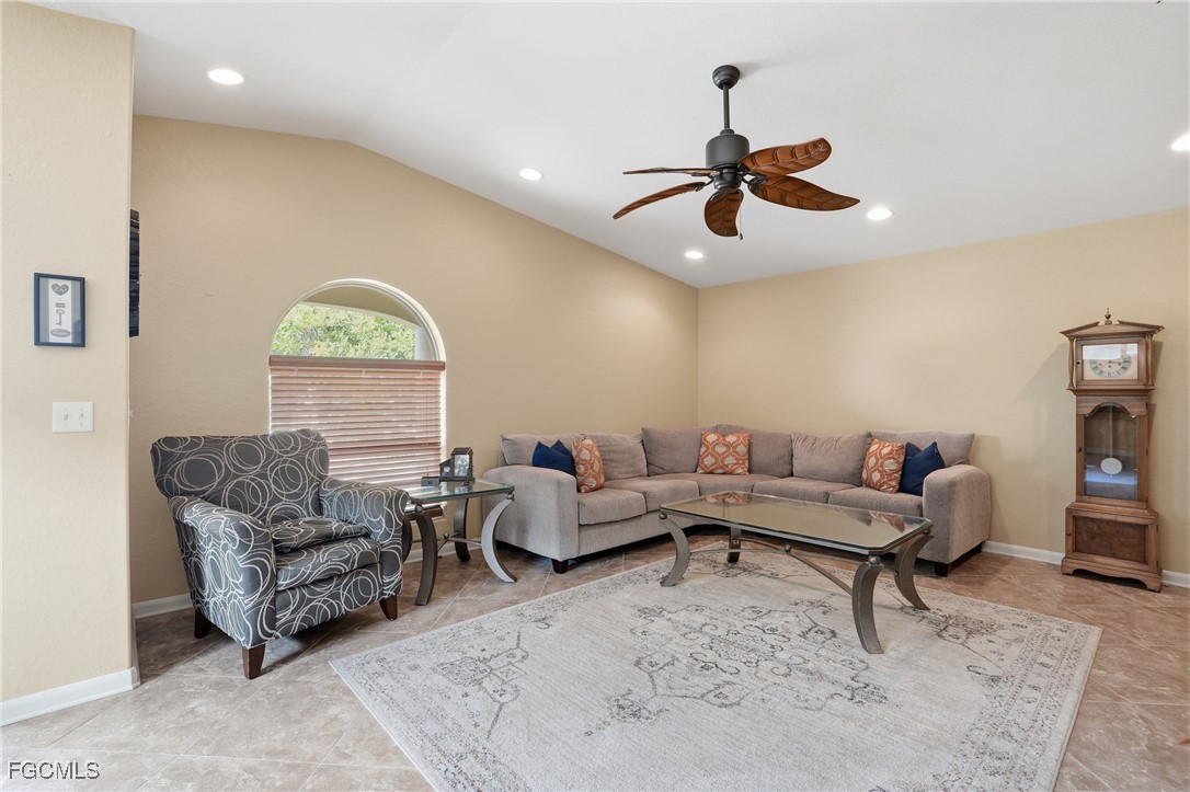 5541 Winkler Road Fort Myers, FL 33919 - Photo 4 of 22 a living room with furniture and a large window