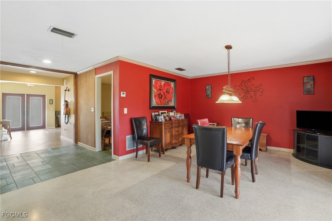 5541 Winkler Road Fort Myers, FL 33919 - Photo 7 of 22 a view of a dining room with furniture