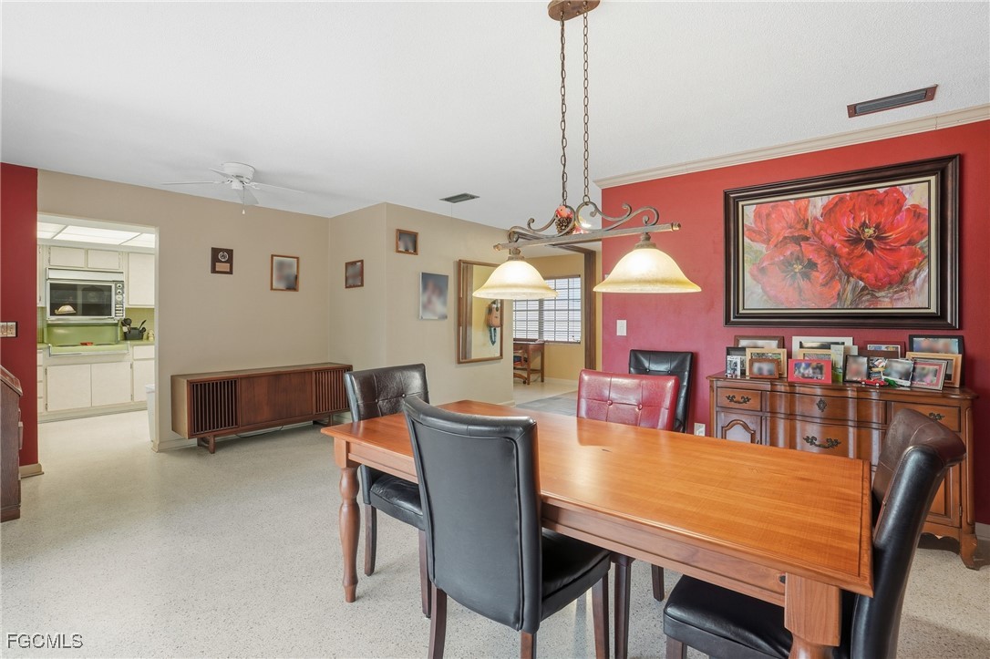 5541 Winkler Road Fort Myers, FL 33919 - Photo 9 of 22 a view of a dining room with furniture
